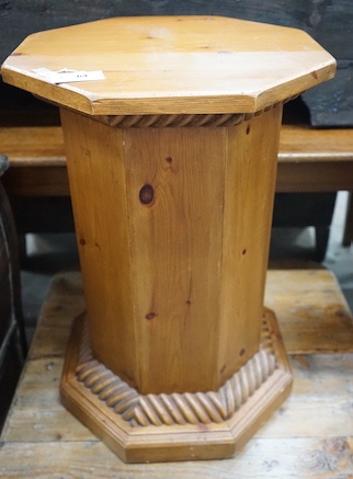 An octagonal pine pedestal, width 50cm, height 75cm